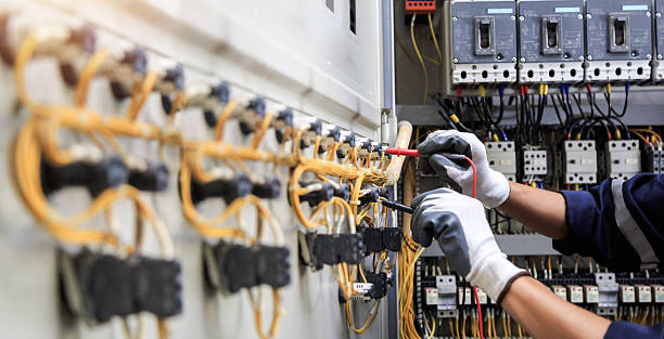 Professional Electrical Panel Upgrade technician working in Guthrie County County, IA